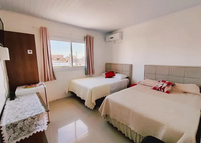 Camelo locação de Suítes Individuais Pousada com Cozinha e Sala Compartilhada