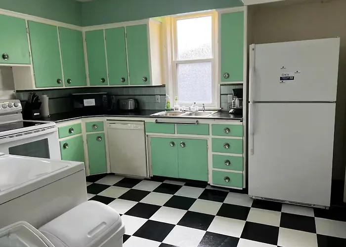 Falls Retreat: Riverside Downtown Getaway