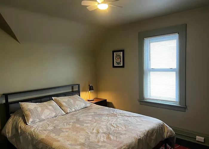 Falls Retreat: Riverside Downtown Getaway