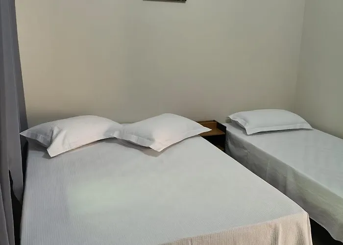 Quarto com ar banheiro frigobar