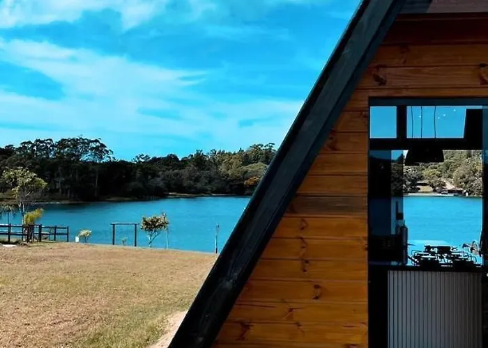 Chalé com hidromassagem de frente para a lagoa