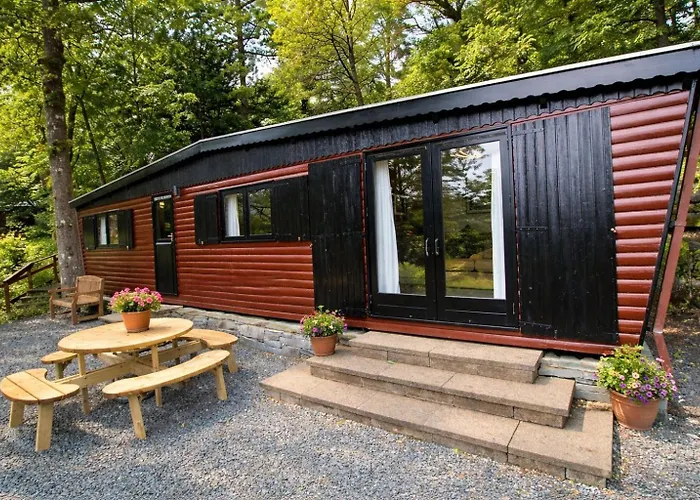 Neaum Crag Lodge Ideal For A Couple Or Family With Young Children In A Woodland Setting At Skelwith Bridge