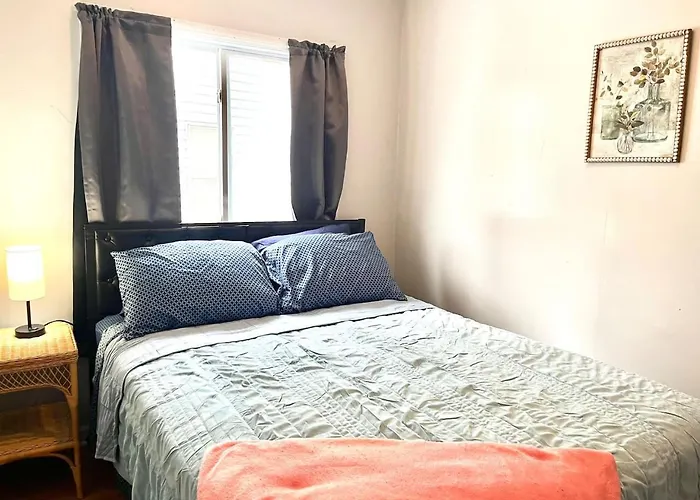 Queen Bed Private Room Shared Living Spaces