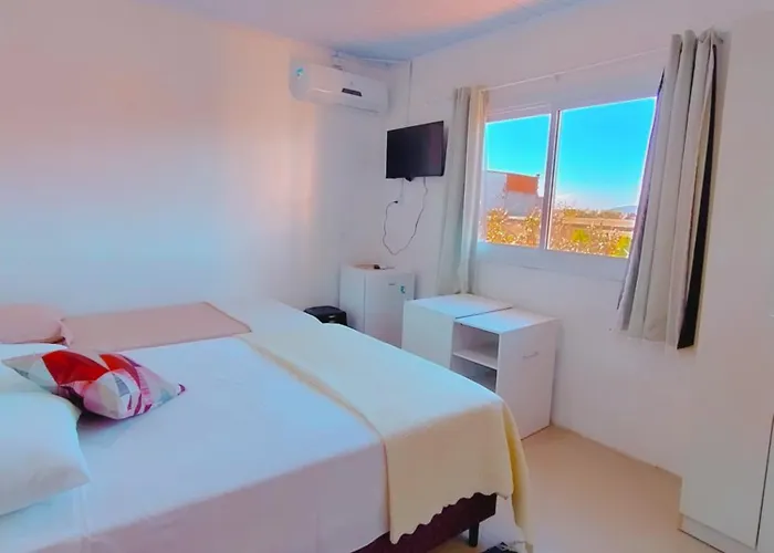 Camelo locação de Suítes Individuais Pousada com Cozinha e Sala Compartilhada