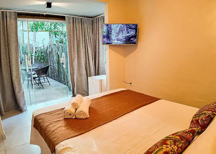 Aruana Suites com Cafe da manha,Piscina, Reserva Natural da Sapiranga 5km da Vila de Praia do Forte
