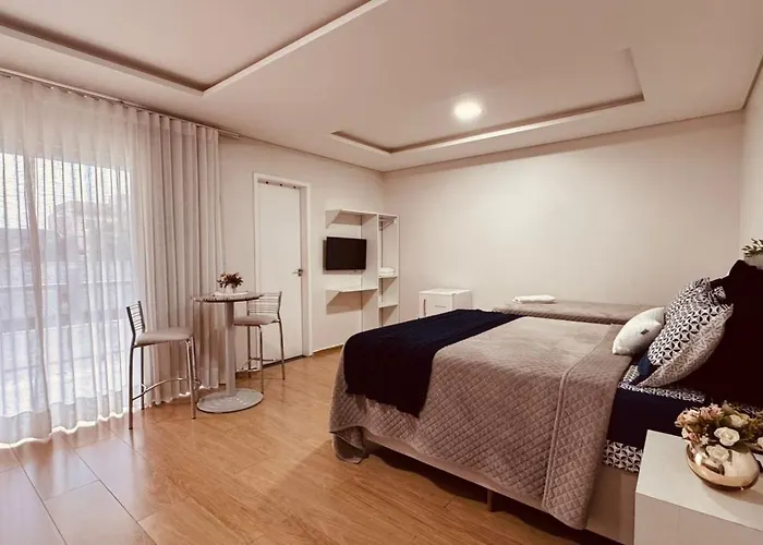 POUSADA DONATELLA Modernidade e conforto para noites tranquilas