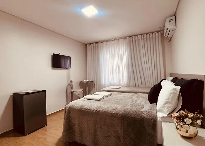 POUSADA DONATELLA Modernidade e conforto para noites tranquilas
