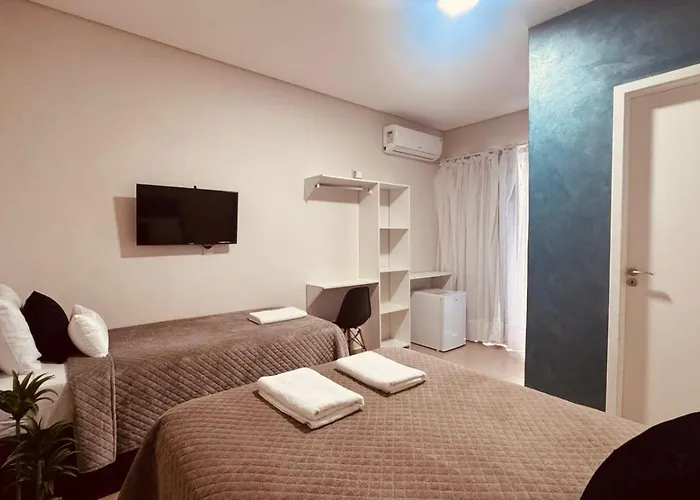 POUSADA DONATELLA Modernidade e conforto para noites tranquilas