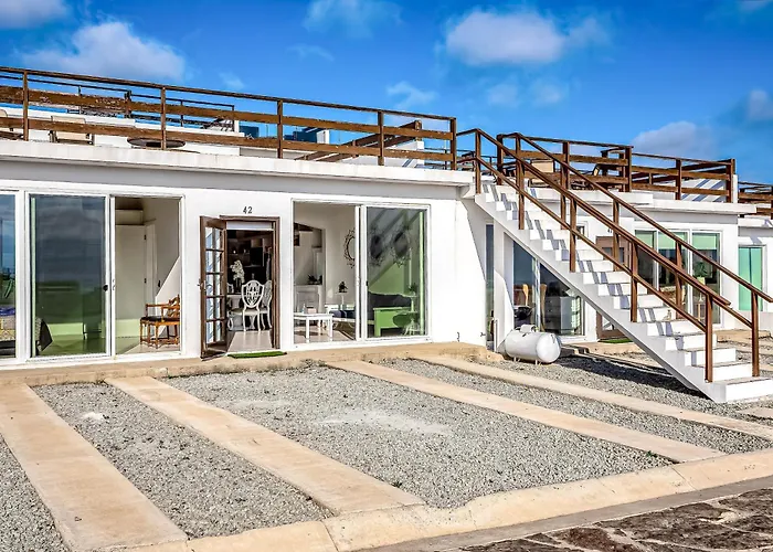 Dog-Friendly Oceanfront Villa With Rooftop Patio, Pool Access, & Kitchen