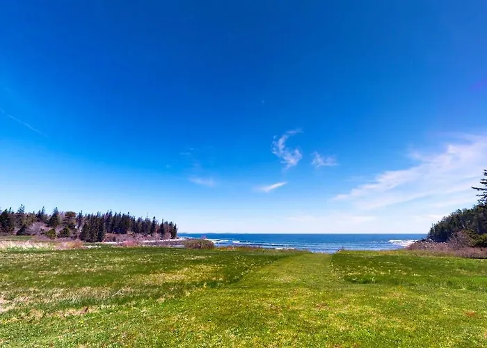 Tranquil Getaway On The Coast With Beach Access, Ocean Views, & Screened Porch