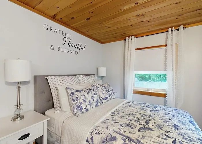 Scenic Retreat With A Spacious Deck, Gas Fireplace, And Moosehead Lake Views