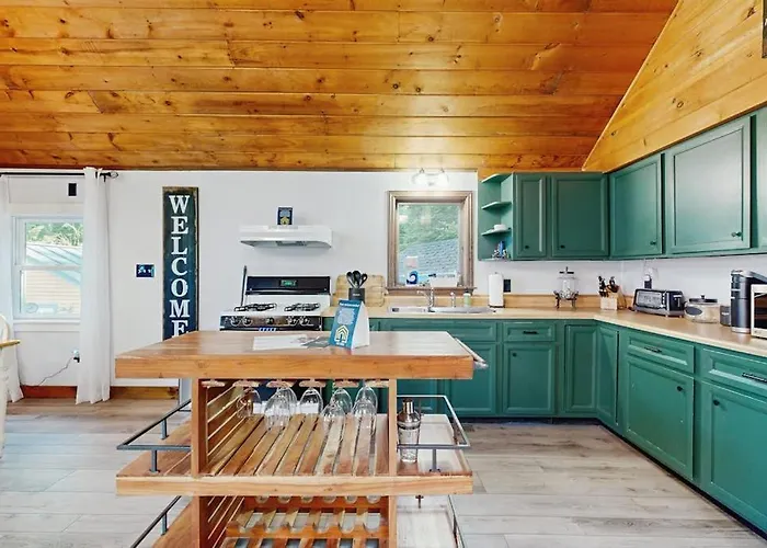 Scenic Retreat With A Spacious Deck, Gas Fireplace, And Moosehead Lake Views