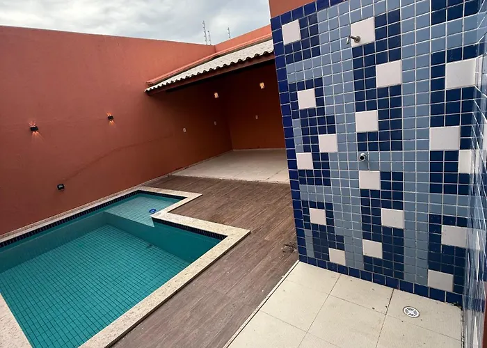 Suíte master com Acesso Total à Casa de Luxo com Piscina e Área Gourmet