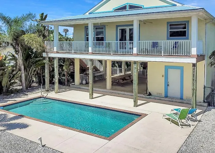 3 Bed 3 Bath Home On Quiet Canal With Heated And Chilled Pool