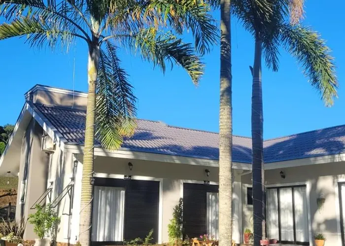 Suítes Villa Pomerode Hospedagem - Conforto e aconchego conectados com a Natureza