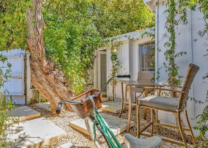 Vine-Covered Garden Suite | Queen + Patio