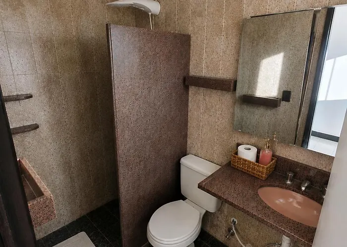 Quarto Privativo Próximo ao Relógio das Flores
