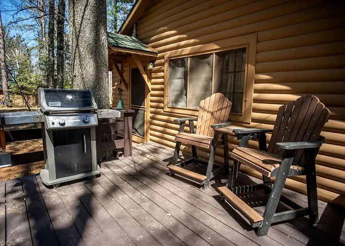 Secluded Rustic-Modern Cabin With Rock Fireplace & Pine-Surrounded Deck Near Babbitt, Minnesota