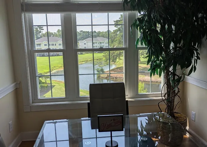 Beautiful 1500 S F 3 Bd - 2 Ba Condo Overlooking Stream And Golf Course
