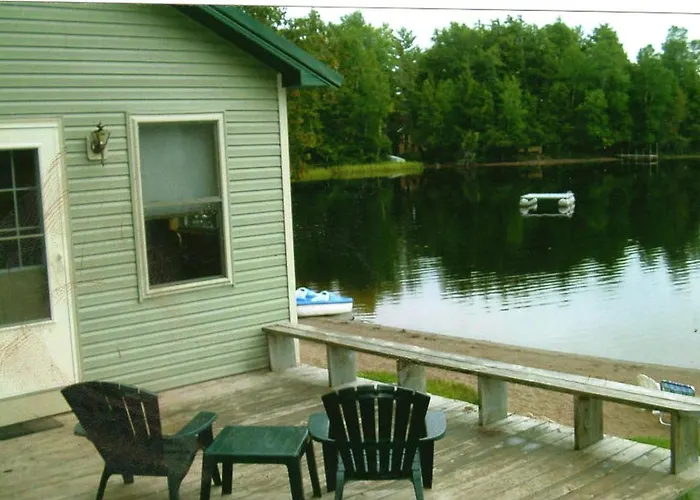 Fun Beachfront Cabin On Lake Resort In Presque Isle, Wisconsin