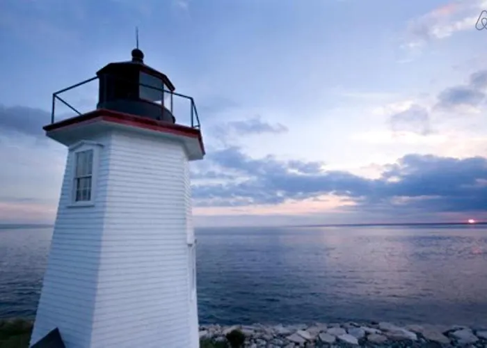Historic Lighthouse Cottage Rental With A Secluded Beach In Pocasset, Massachusetts