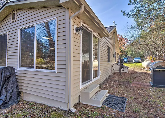 Riverfront Grayling Retreat W/ Fire Pit & Dock!