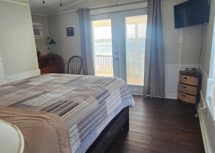 Woody'S By The Lake Llc
