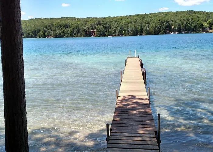 Log Cottage On Blue Lake