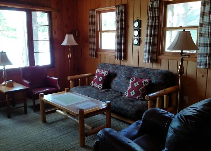 Log Cottage On Blue Lake