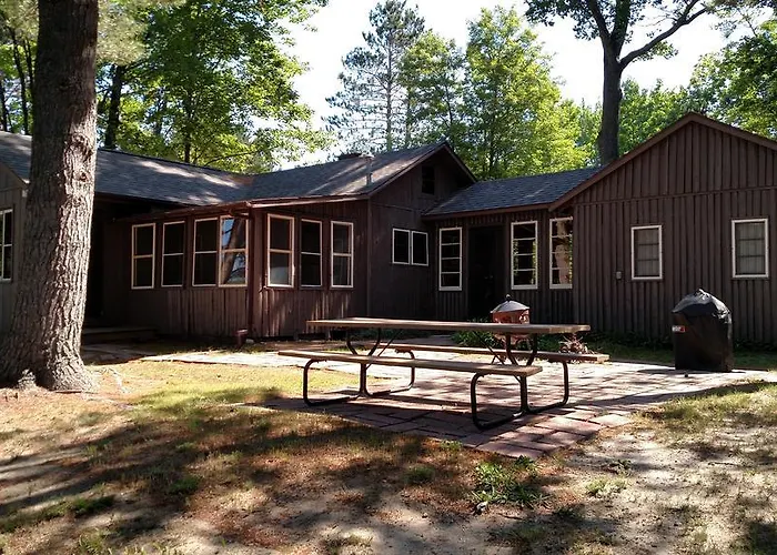 Log Cottage On Blue Lake