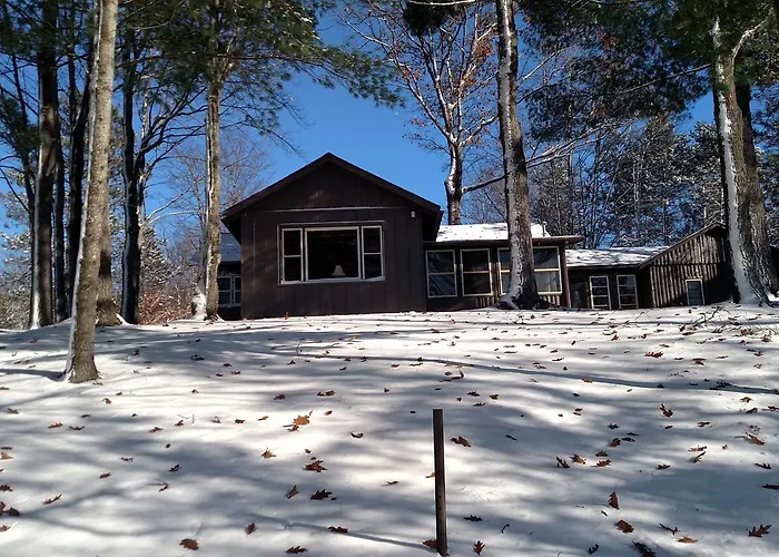 Log Cottage On Blue Lake